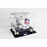 Miniature NFL helmet, signed by Phillip Rivers, Tony Romo, Brett Favre, Tom Brady, Eli Manning,
