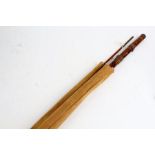 Bamboo three piece fishing rod (first half of 20th century), with carrying bag AF