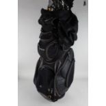 MacGregor golf clubs and others, with Dunlop woods and a driver, with golf bag