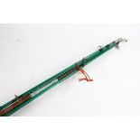 Metal four piece fishing rod, painted in green