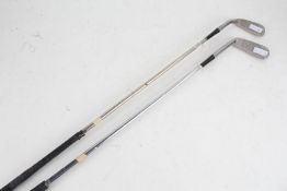 Spalding putter, Gold Medal Mk. IV, together with a Scottish 2 iron, marked W. Smith Royal Cape C. C