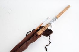 Three piece split cane fishing rod, with cork handle and carrying bag