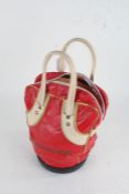 Dunlop red leather bag and contents of golf balls (qty)