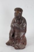 20th century Chinese pottery figure, of a bearded gentleman, with a brown glaze, 33cm tall