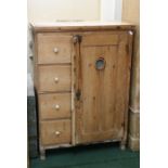 Victorian pine food hutch, having single hinged door with circular mesh panel enclosing shelves,