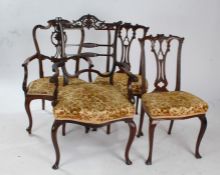 Four late Victorian salon chairs, two carvers and two singles, some with floral decoration to the