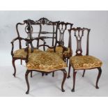 Four late Victorian salon chairs, two carvers and two singles, some with floral decoration to the