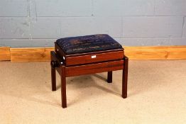 Edwardian style mahogany piano stool, the hinged adjustable seat raised on square legs,