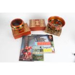 Russian works of art and ephemera, to include carved and painted wooden bowls, fish badge, postcards