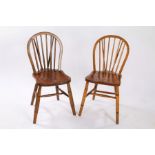 Pair of elm seated stick back chairs (2)