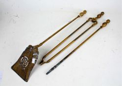 Set of three 19th century brass fire irons, having knopped handles and comprising a poker, shovel