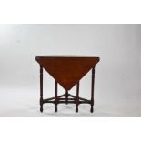 Late Victorian mahogany drop leaf table, raised on ring turned supports, 71cm wide