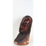 Yoruba carved darkwood male bust, with incised decorations, 43cm high