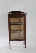 Edwardian display cabinet with a inlaid pediment above three shelves with glazed doors 119cm high