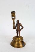 19th century brass candlestick, in the form of a knight, 22.5cm high