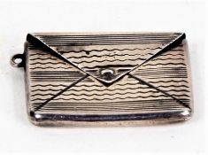 Sterling silver envelope stamp case, with monogram to the front, 3cm