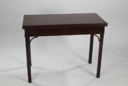 George III mahogany folding card table, the top opening to reveal a green lining, above chamfered