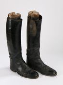 Pair of black leather black leather riding boots, with Tom Hill of London Knightsbridge wooden