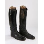 Pair of black leather black leather riding boots, with Tom Hill of London Knightsbridge wooden