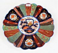 Imari pattern charger, the central field with depiction of a foliate basket, surrounded by scale ,