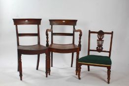 Two 19th century mahogany bar back dining chairs, to include a carver example, together with a