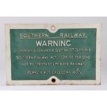 Cast metal railway sign "SOUTHERN RAILWAYS WARNING IS HEREBY GIVEN UNDER SECTION 97(2) OF THE