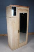 Victorian pine wardrobe, with simulated lead glazed window to the pediment, single mirrored door