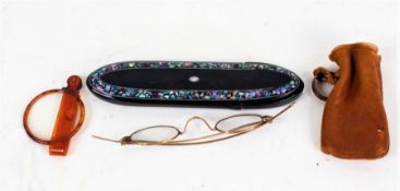 Pair of gilt metal spectacles, housed in an ebonised and other of pearl inlaid glasses case, pair of