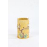 Chinese porcelain brush pot, applied with a blossoming tree on yellow ground, unmarked, 10cm high