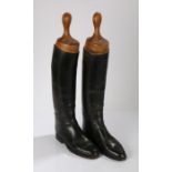 Pair of black leather riding boots and boot trees, approximately size 9