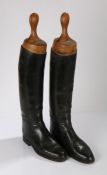 Pair of black leather riding boots and boot trees, approximately size 9