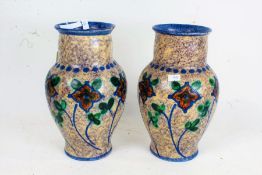 Upsala-Ekeby, pair of Swedish pottery vases, each of baluster form, painted with orange flowers of a