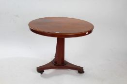 Victorian mahogany tilt top breakfast table, the circular top raised on column and tri-foil base,