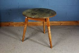 20th century pine cricket table, circular top raised on three turned legs 75cm diameter 77cm tall