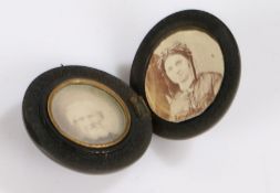 Victorian vulcanite locket, enclosing two portrait minitures of a lady and a gentleman, surrounded