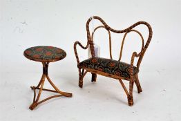 Miniature Edwardian bamboo settee and matching table, settee 17.5cm long, table 9.5cm diameter (2)