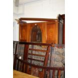 Edwardian mahogany and marquetry inlaid wardrobe, the dentil inlaid pediment above an oval