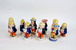 Eight Staffordshire pottery toby sugar sifters, mostly Victorian, together with a Staffordshire