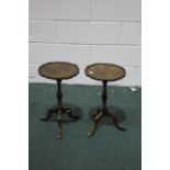 Pair of 20th century walnut wine tables, each with piecrust tops and tripod legs (2)