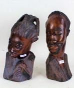 Pair of Yoruba carved darkwood busts, female and male, with incised decorations, 37cm and 36cm