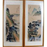 Pair of 20th century Chinese paintings on silk, each depicting mountainous landscapes, housed within