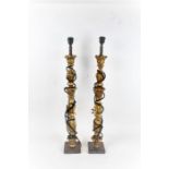 Pair Rococo style gilt wooden table lamps, each raised on square bases, each 86cm high including