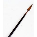 Southern Africa Zulu spear, the metal spearhead above a wooden body with a carved pommel,105cm long