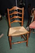 19th Century elm ladder back dining chair, the back with four splats above a cane seat, raised on