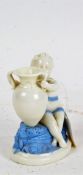 Royal Worcester porcelain vase, in the form of a seated cherub holding an urn, with blue painted