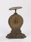 Salter's letter balance scales, the brass pan and dial on a cast iron frame, 12.5cm wide, 19cm high