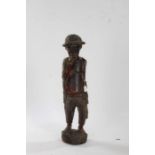 African carved wooden figure, in the form of a fisherman and modelled in a standing position, 83cm