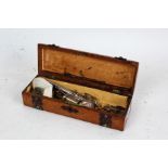 Late Victorian golden oak glove box containing a De La Rue & Co. pocket inkwell, badges, jewellery