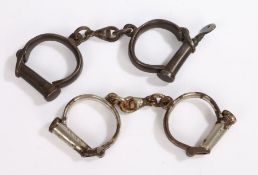 Victorian/Edwardian British police handcuffs, first pair of heavy steel construction, marked '