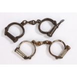 Victorian/Edwardian British police handcuffs, first pair of heavy steel construction, marked '